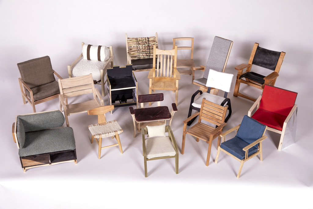 A lot of hand made fine furniture chairs are grouped together for a photograph.