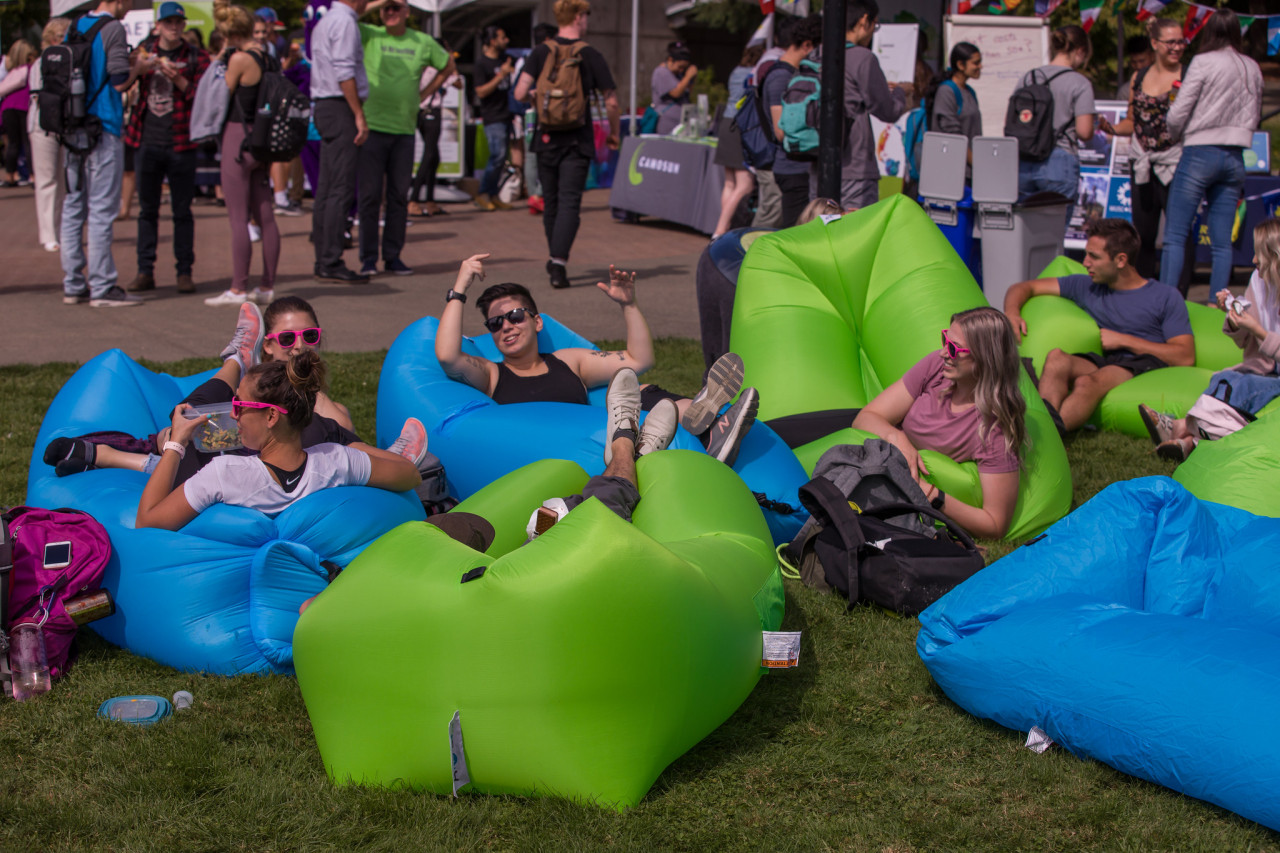 CamFest students on blow-up loungers